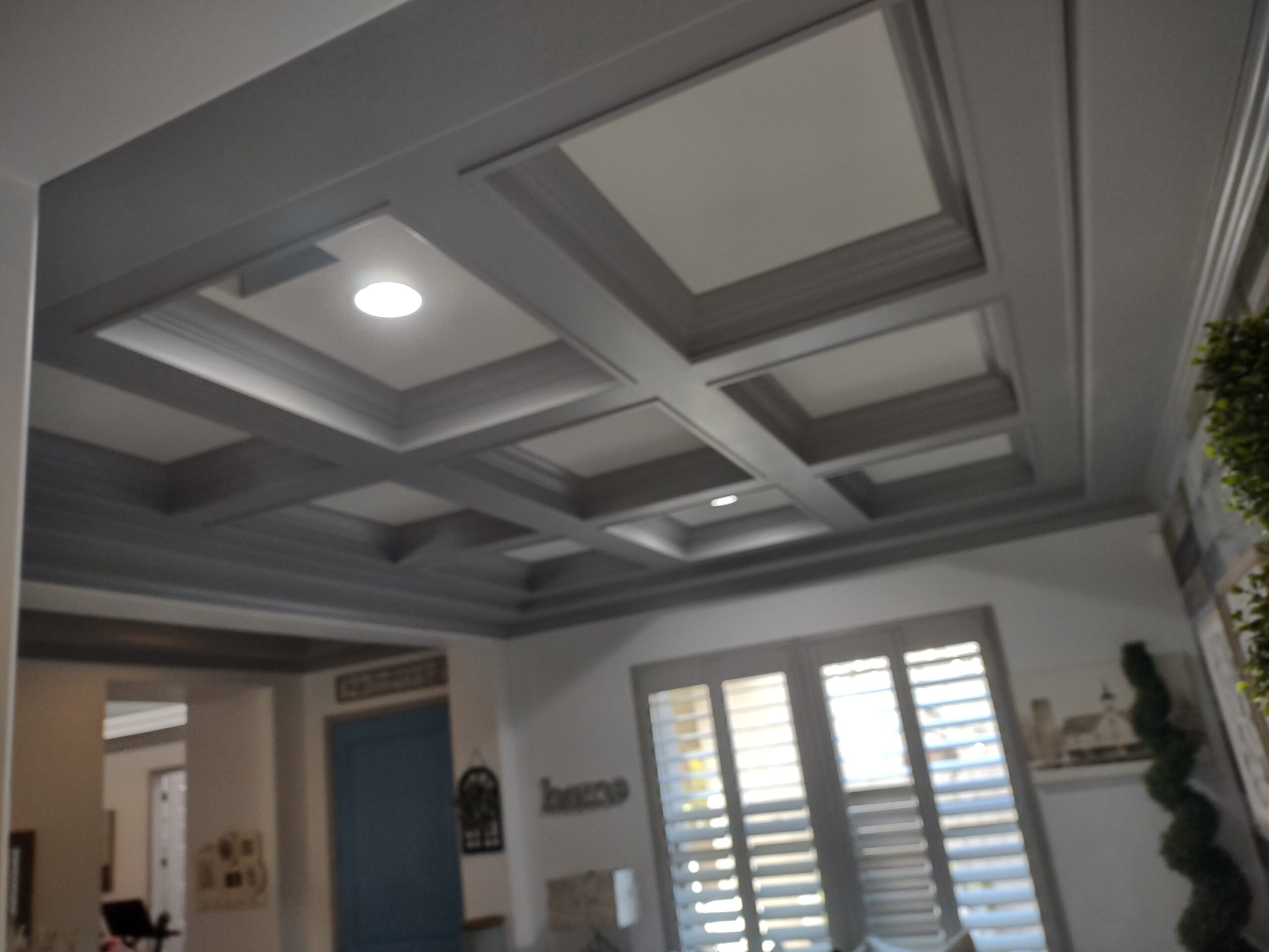 Custom decorative ceiling treatment installation in Scottsdale AZ by Heritage Crown and Millworks