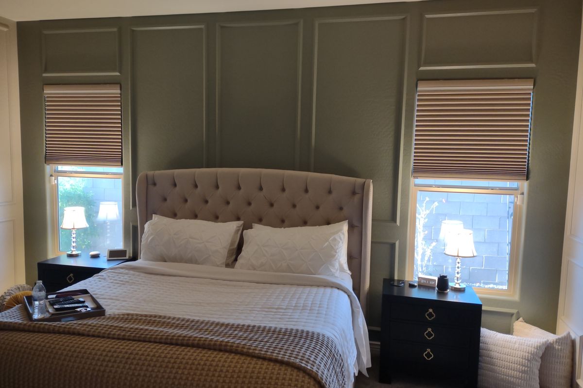 Custom bedroom feature wall with decorative moulding by Heritage Crown and Millworks