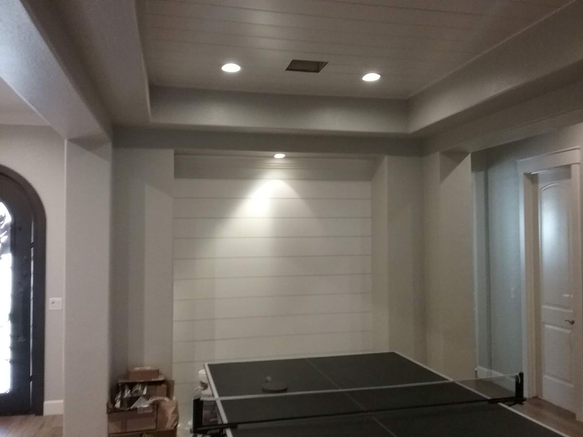 Custom horizontal shiplap interior feature wall by Heritage Crown and Millworks